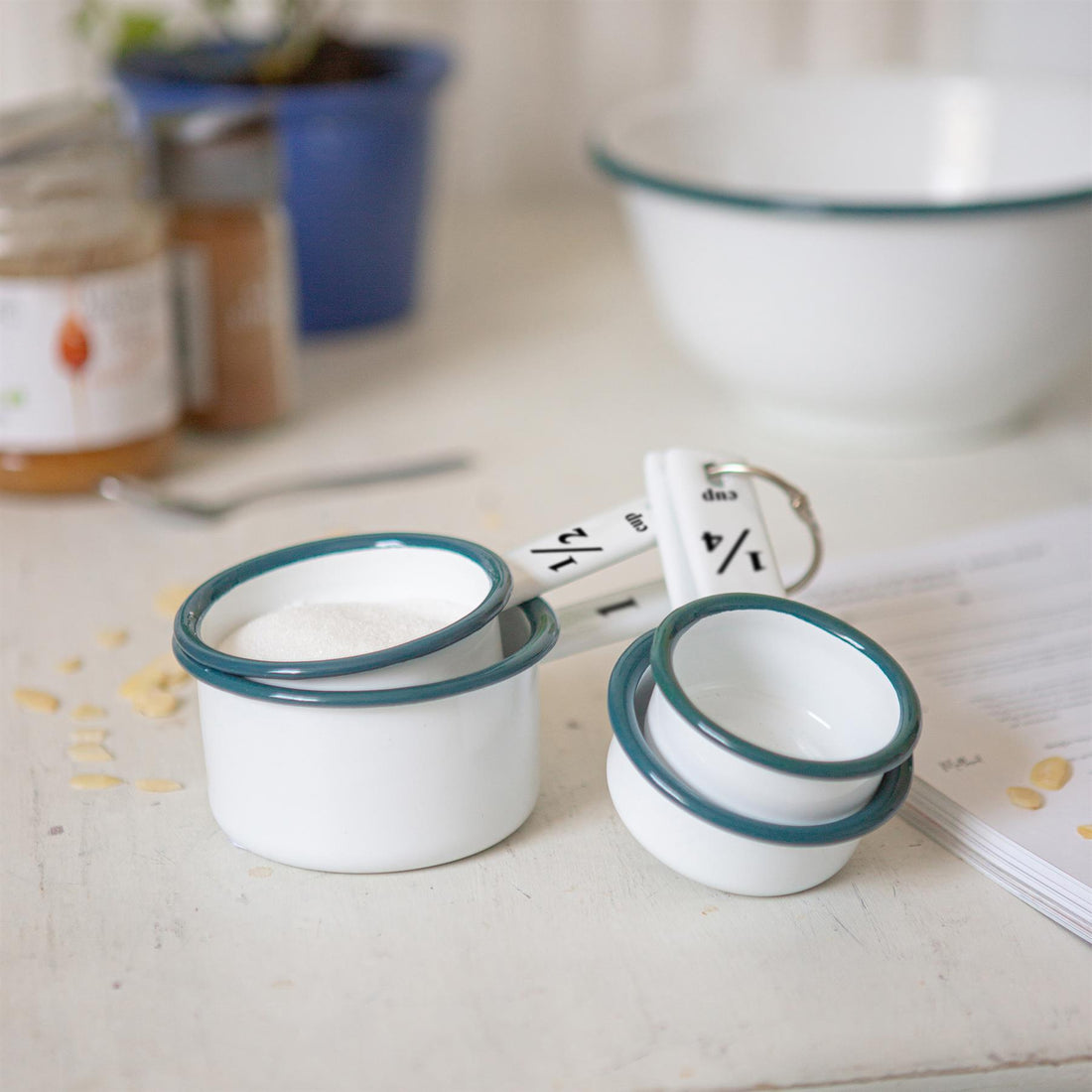 4-Piece White Enamel Measuring Cup Set with Green Rim